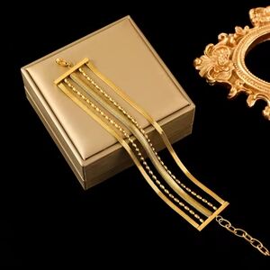 18 KT Gold Over Titanium Layered Bracelet